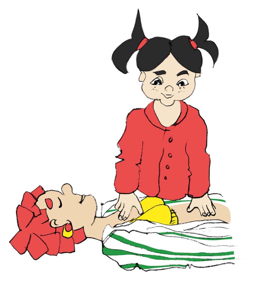 Kind übt Herzdruckmassage